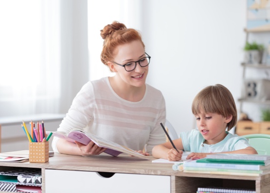 tutor helping a child with dislexia