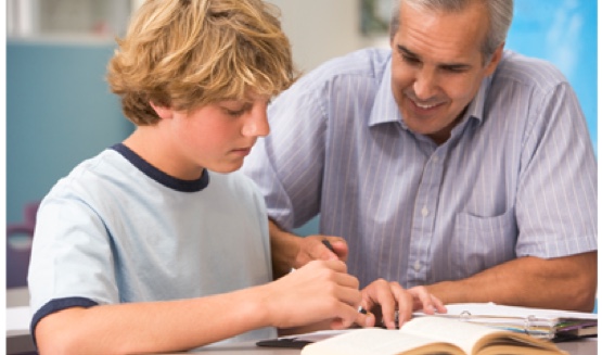 teenage boy being tutored by professional