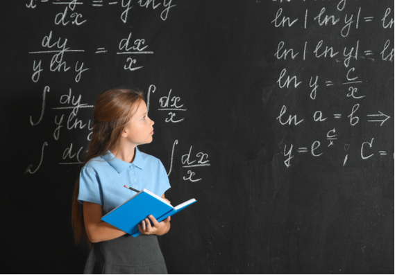 a student doing math during a dyscalculia tutoring session